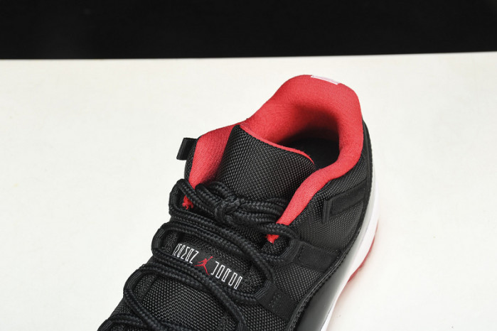 air jordan 11 retro low "bred" black/ red mens 528895-012